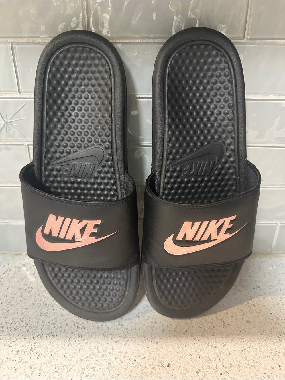 Nike Black Slide Sandals with Pink Logo